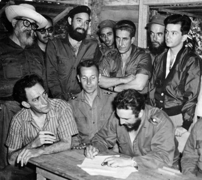 Fidel Castro signing the first agrarian law in 1959