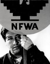 Cesar Chavez holding a NFWA sign