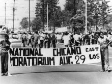 National Chicano Moratorium sign